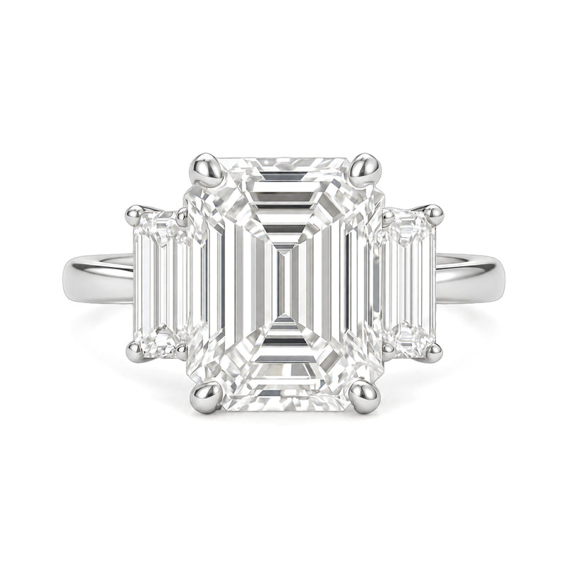 Ella Ring white gold emerald-cut three-stone diamond ring on a white background